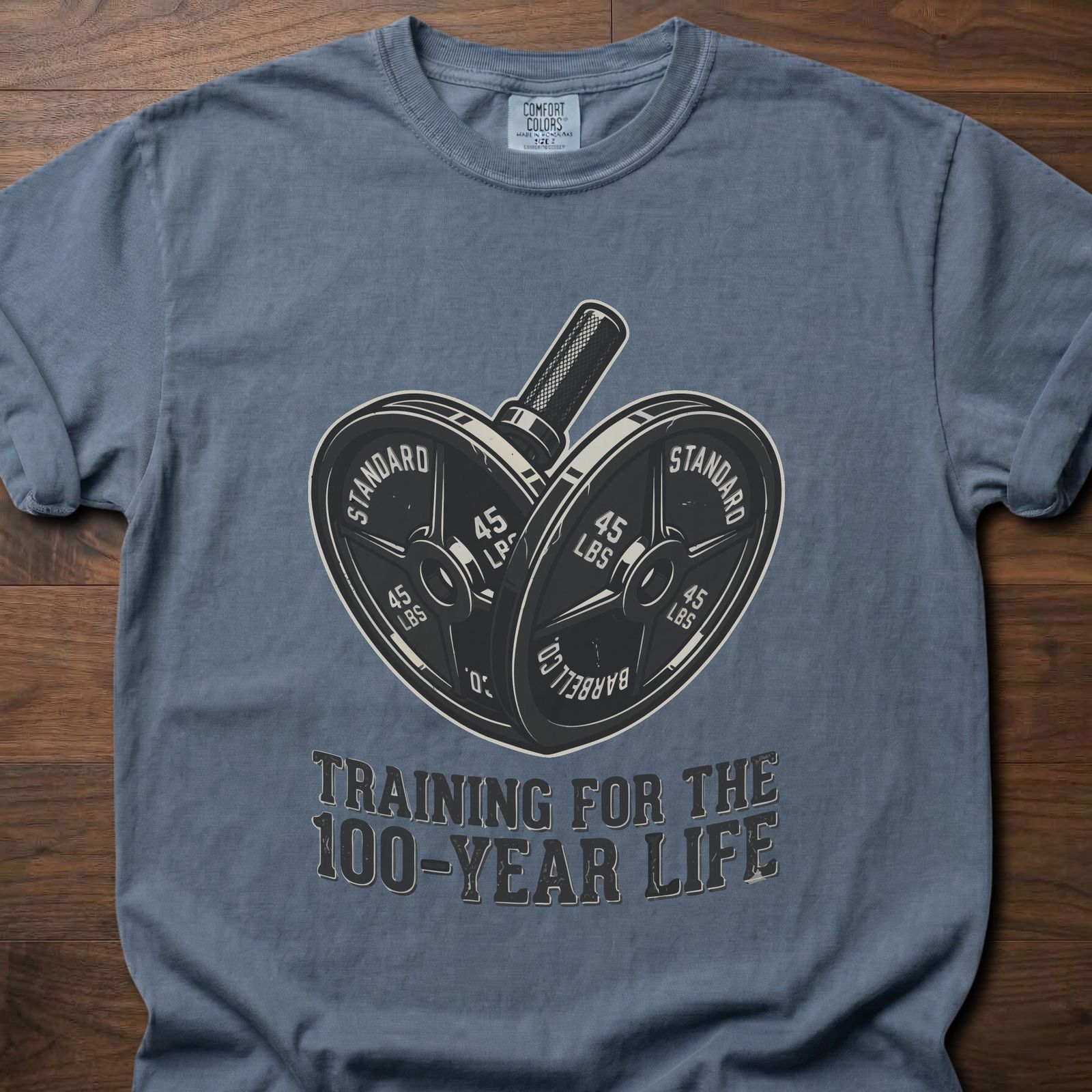 100-Year Life strength training t-shirt featuring heart-shaped weight plates and barbell design – Blue Jean