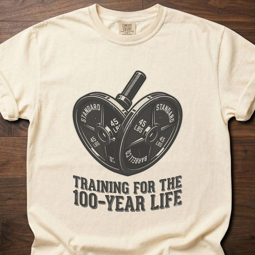 100-Year Life strength training t-shirt featuring heart-shaped weight plates and barbell design – Ivory
