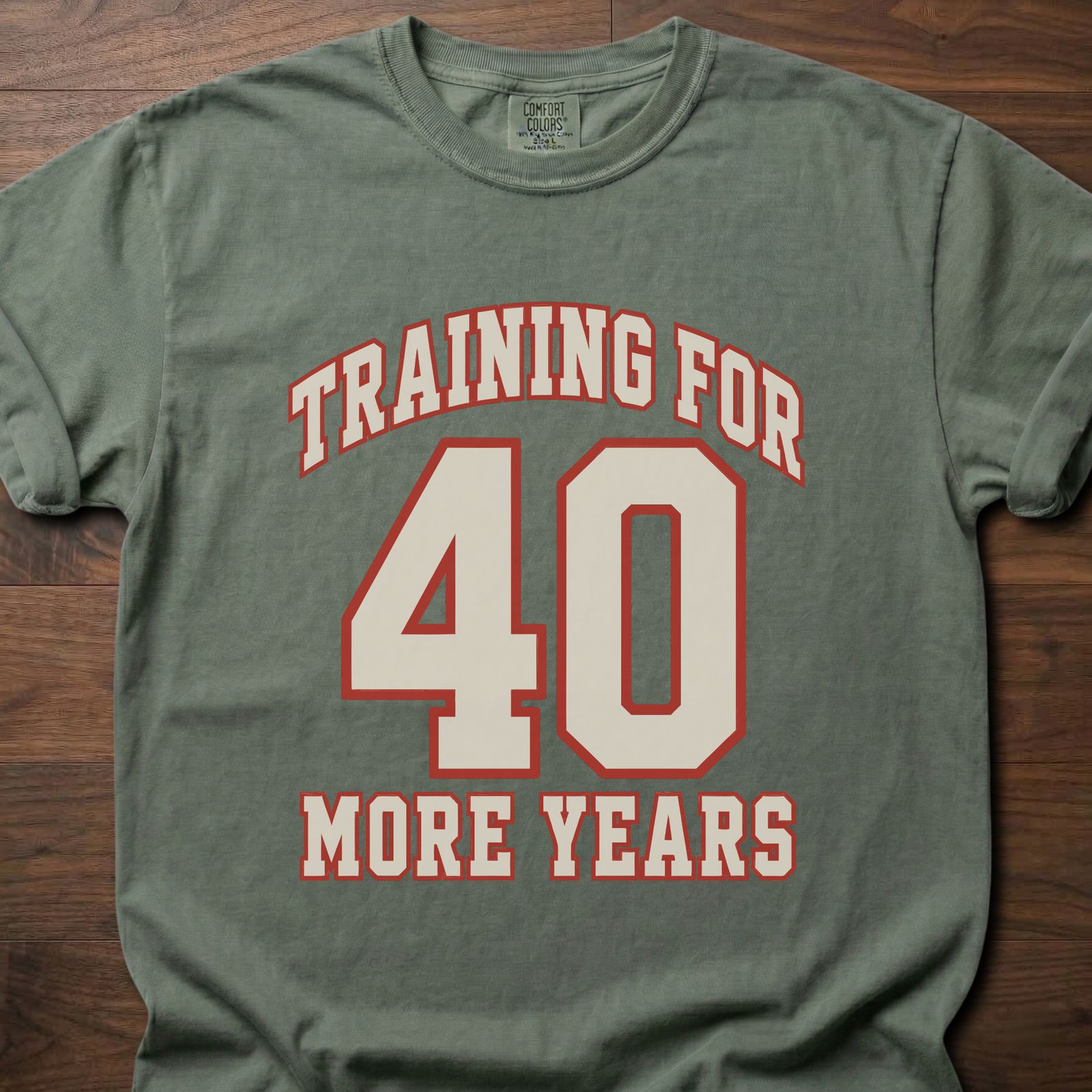 40 More Years strength training t-shirt with athletic varsity number design – Moss