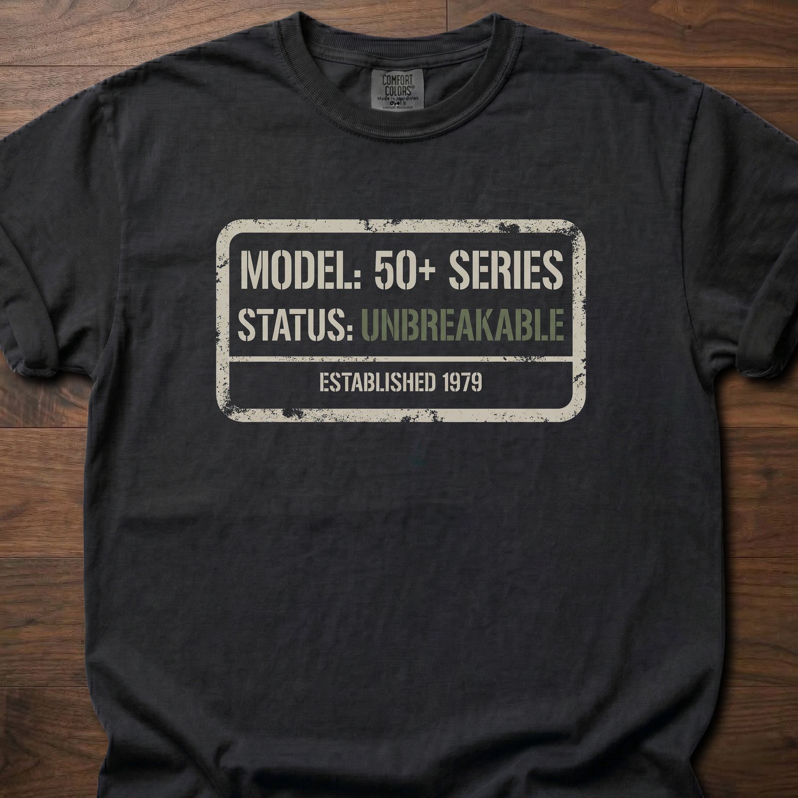 50+ Unbreakable T-Shirt with model series badge design for longevity fitness apparel – Black