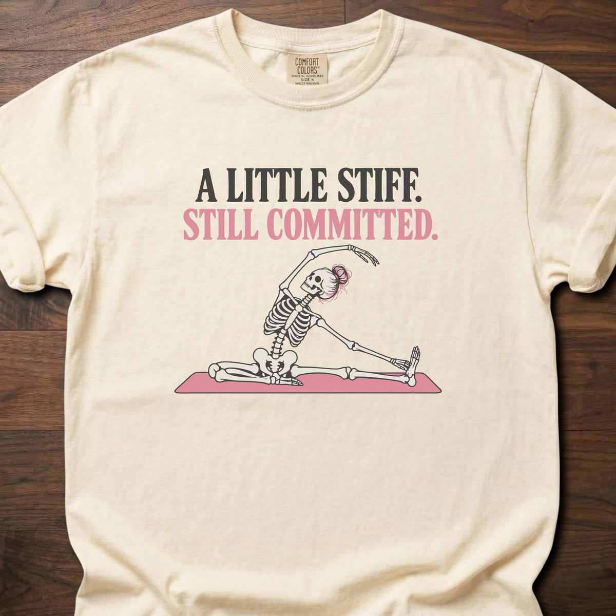 A Little Stiff funny gym shirt with retro bold type and illustrated fitness graphic – Ivory