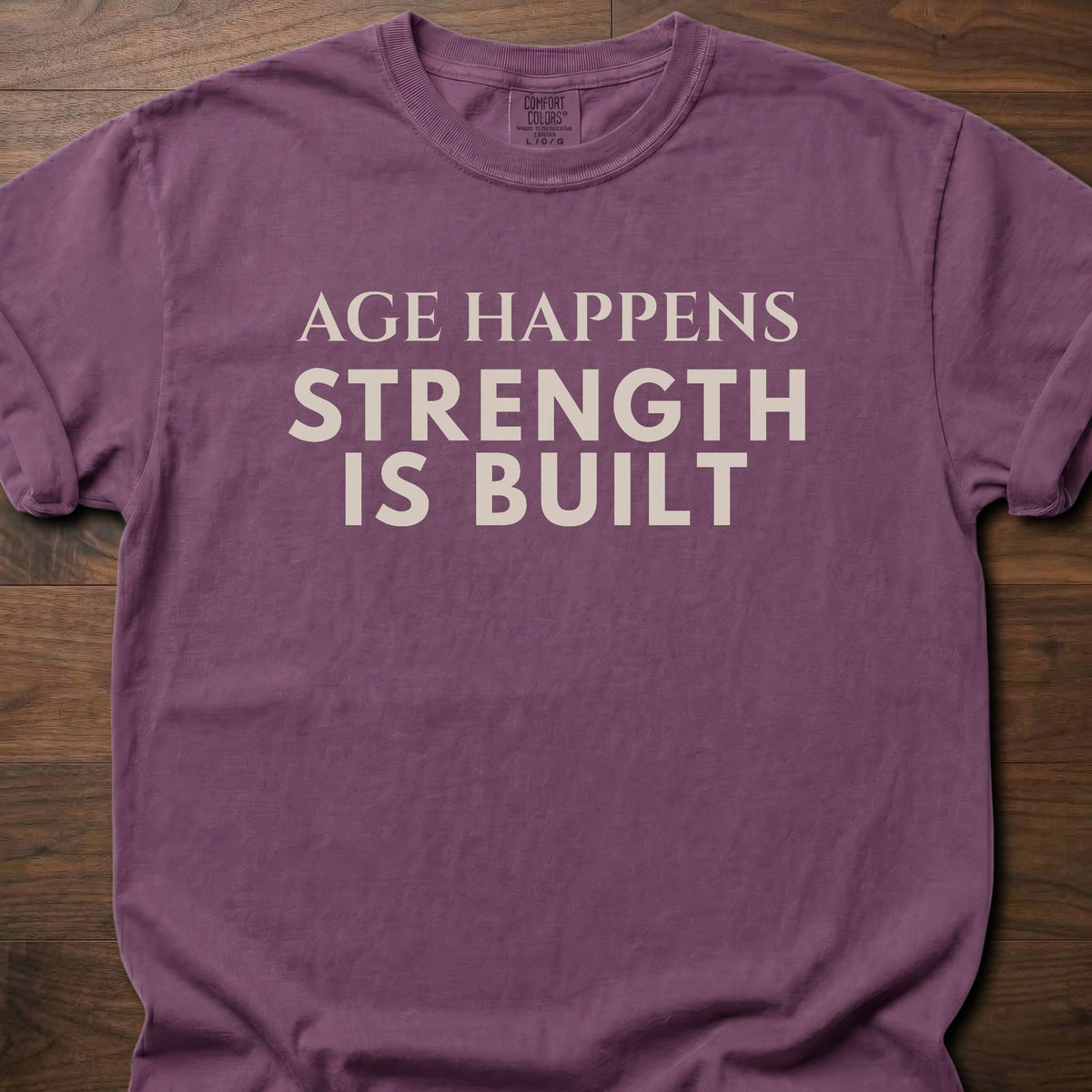 Age Happens strength training t-shirt with clean bold typographic graphic – Berry