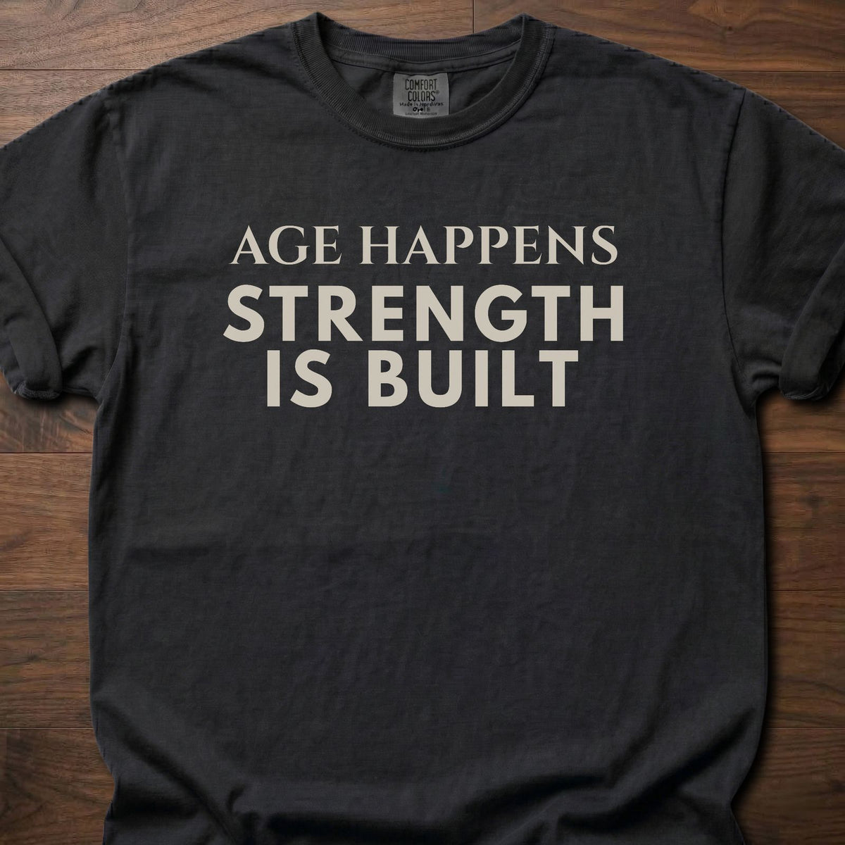 Age Happens strength training t-shirt with clean bold typographic graphic – Black