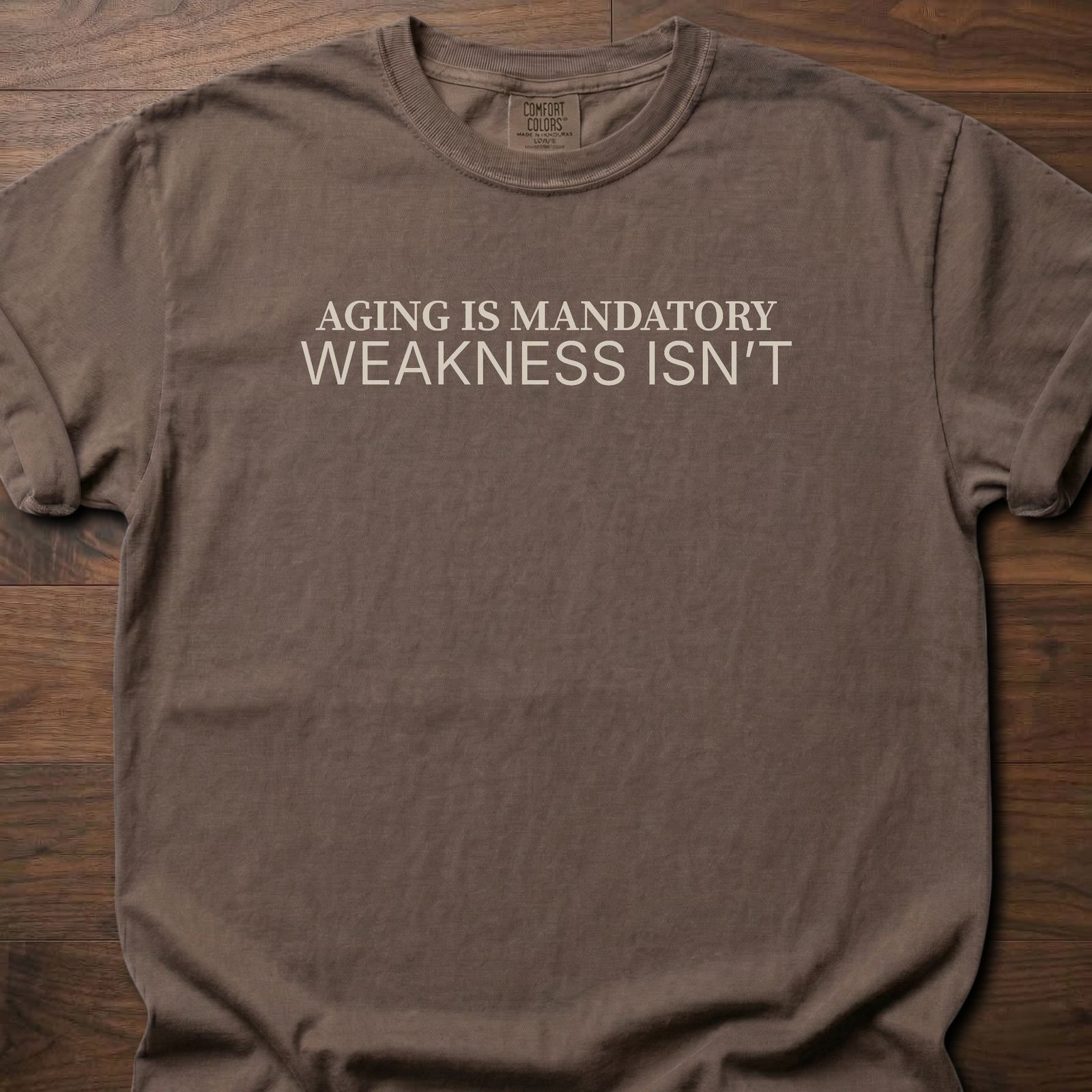 Aging Is Mandatory strength training t-shirt with bold motivational message – Espresso