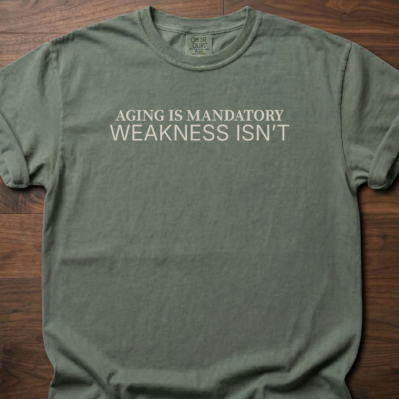 Aging Is Mandatory strength training t-shirt with bold motivational message – Moss