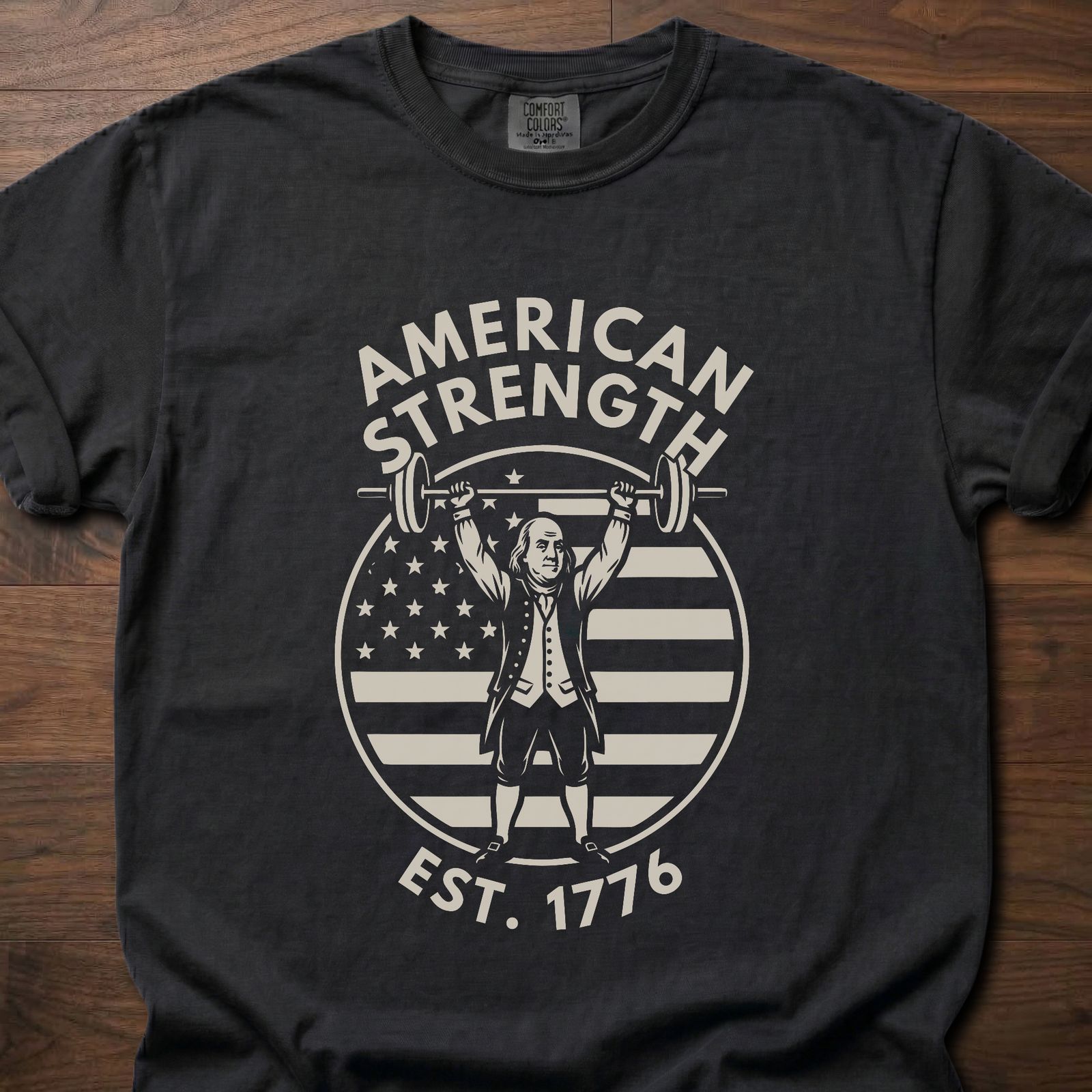 American Strength strength training t-shirt featuring Benjamin Franklin lifting barbell with flag design – Black