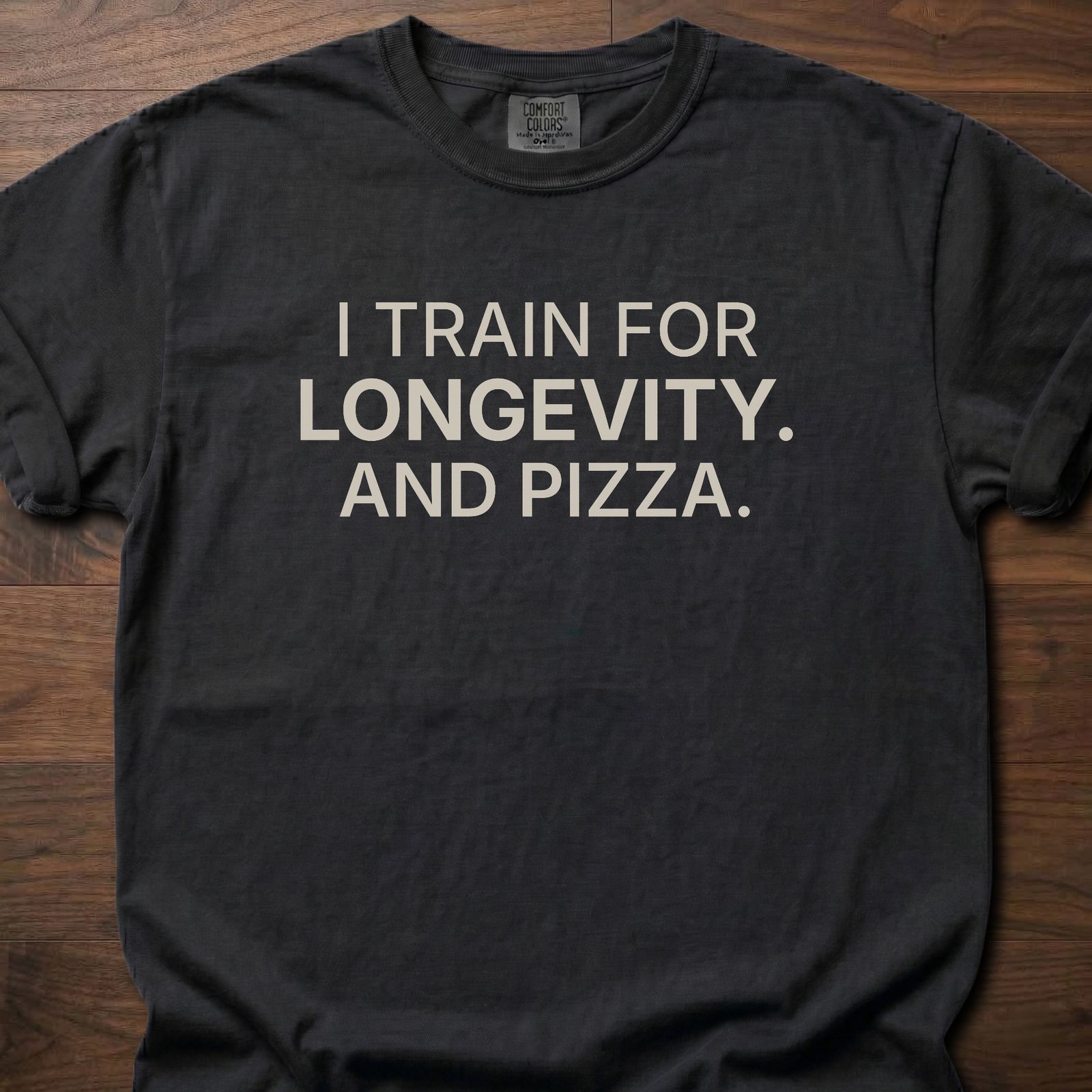 And Pizza T-Shirt featuring I train for longevity and pizza text for fitness lifestyle apparel – Black