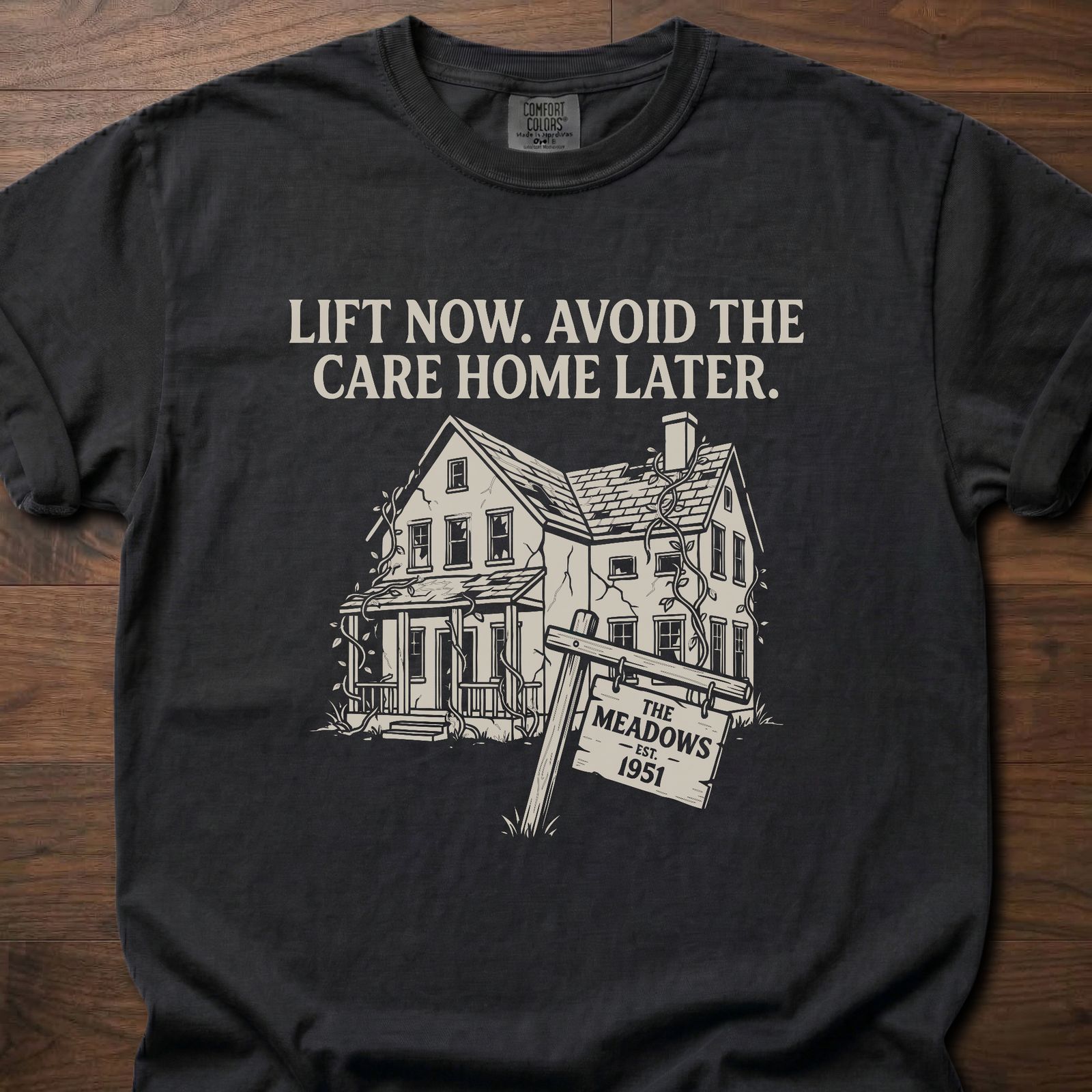Avoid The Care Home strength training lifestyle clothing with vintage house graphic and Meadows 1951 sign – Black