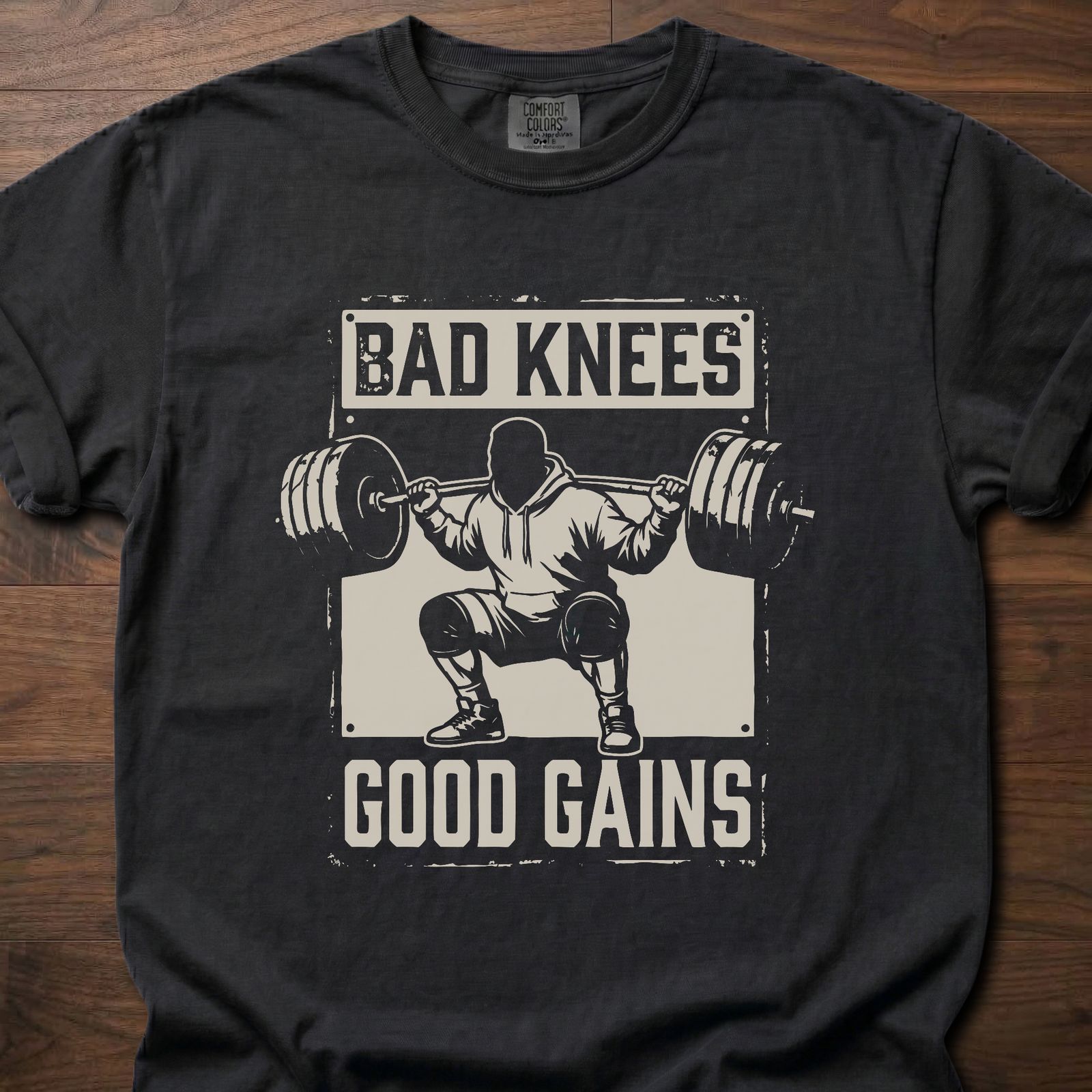 Bad Knees Good Gains strength training t-shirt featuring weightlifter doing barbell squat – Black