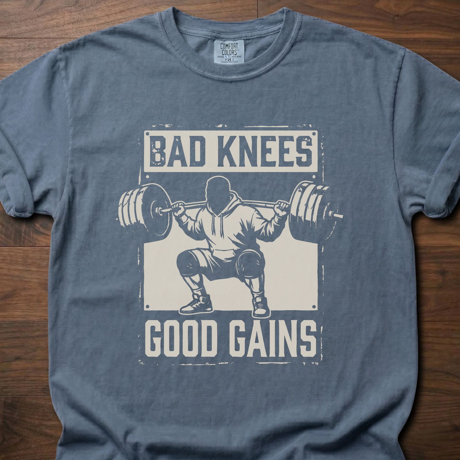 Bad Knees Good Gains strength training t-shirt featuring weightlifter doing barbell squat – Blue Jean