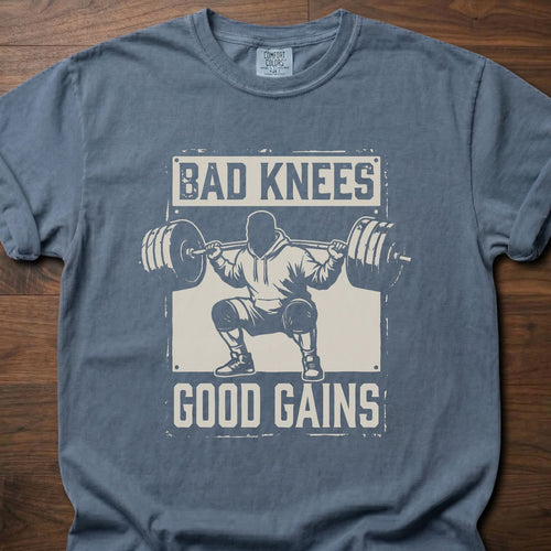 Bad Knees Good Gains strength training t-shirt featuring weightlifter doing barbell squat – Blue Jean