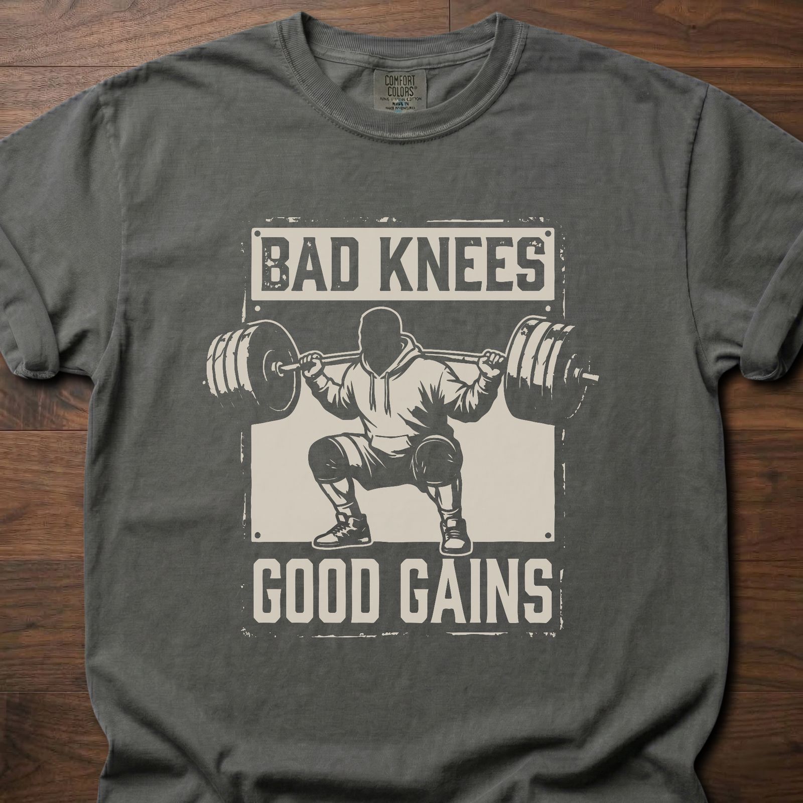 Bad Knees Good Gains strength training t-shirt featuring weightlifter doing barbell squat – Pepper
