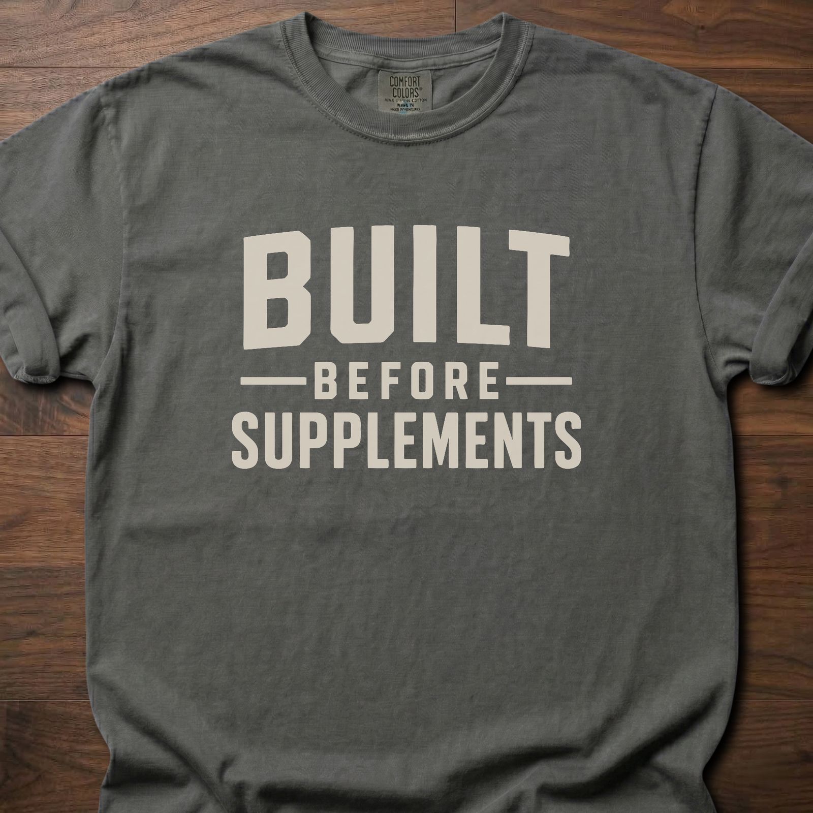Built Before Supplements strength training lifestyle shirt with bold stacked block lettering – Pepper