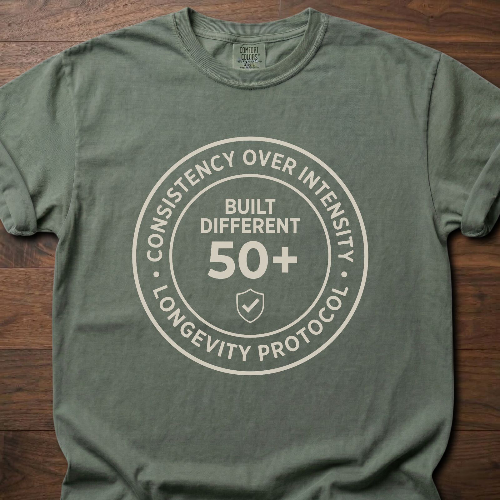 Built Different strength training t shirt with 50+ longevity protocol badge design – Moss