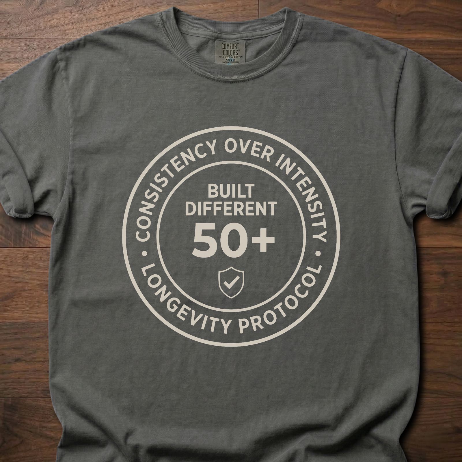 Built Different strength training t shirt with 50+ longevity protocol badge design – Pepper
