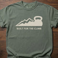 Built For The Climb strength training t-shirt with mountain and kettlebell design – Moss