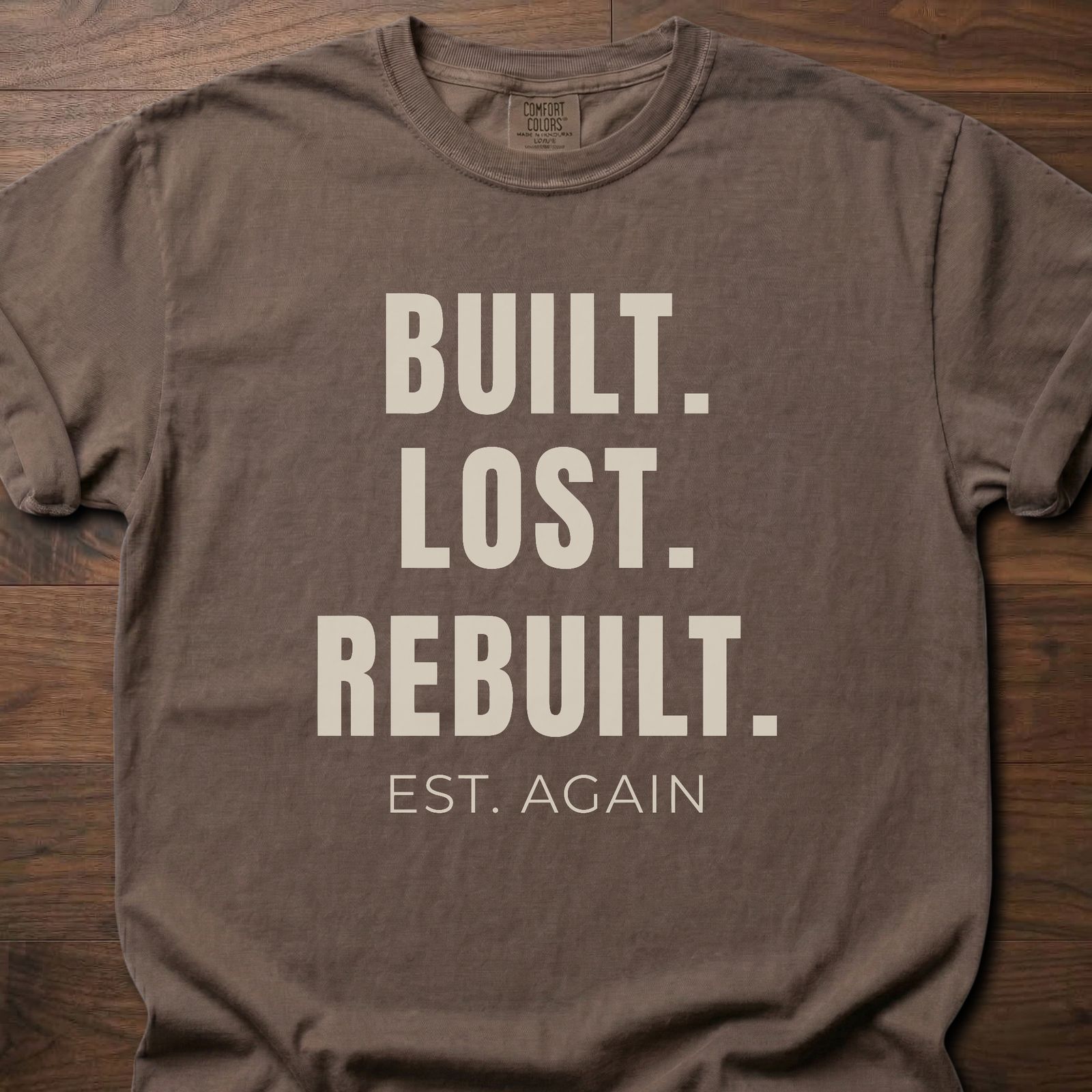 Built Lost Rebuilt strength training lifestyle clothing with resilience message EST. AGAIN tagline – Espresso