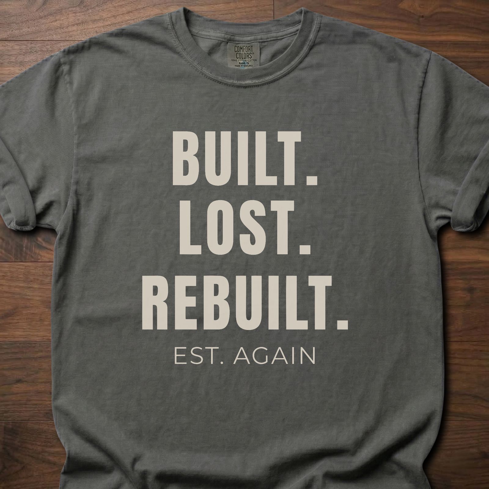 Built Lost Rebuilt strength training lifestyle clothing with resilience message EST. AGAIN tagline – Pepper