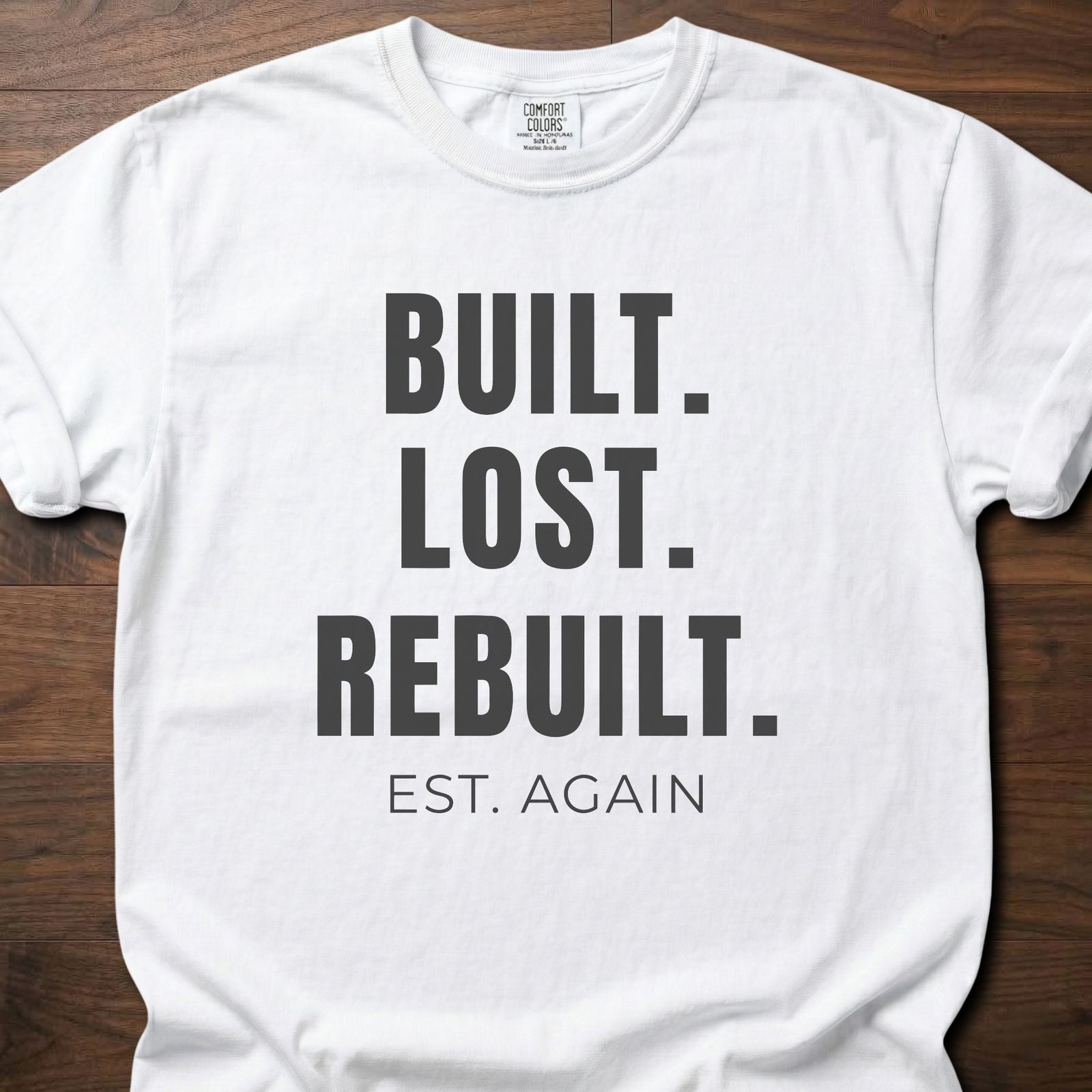 Built Lost Rebuilt strength training lifestyle clothing with resilience message EST. AGAIN tagline – White