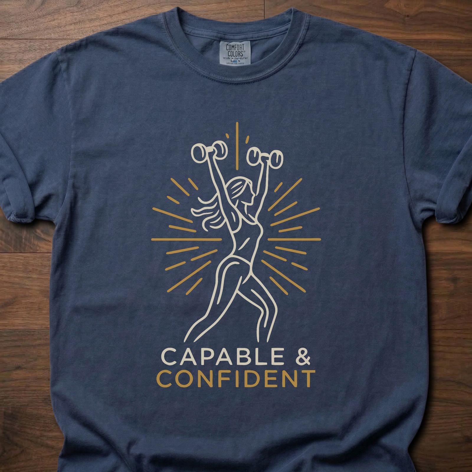 Capable & Confident fitness lifestyle t shirts featuring woman with dumbbells and radiant burst design – Navy