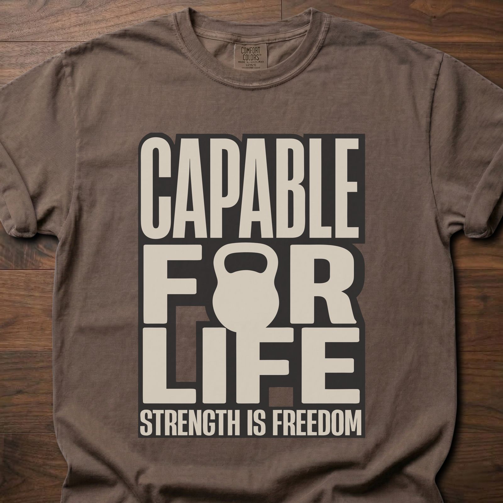 Capable For Life strength training t shirt with kettlebell silhouette and bold typography – Espresso