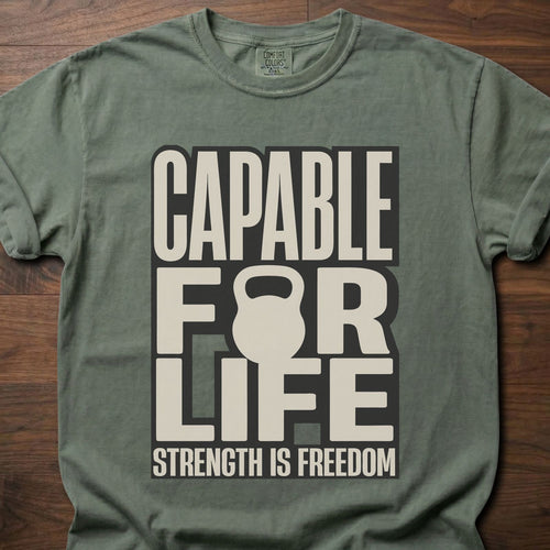 Capable For Life strength training t shirt with kettlebell silhouette and bold typography – Moss