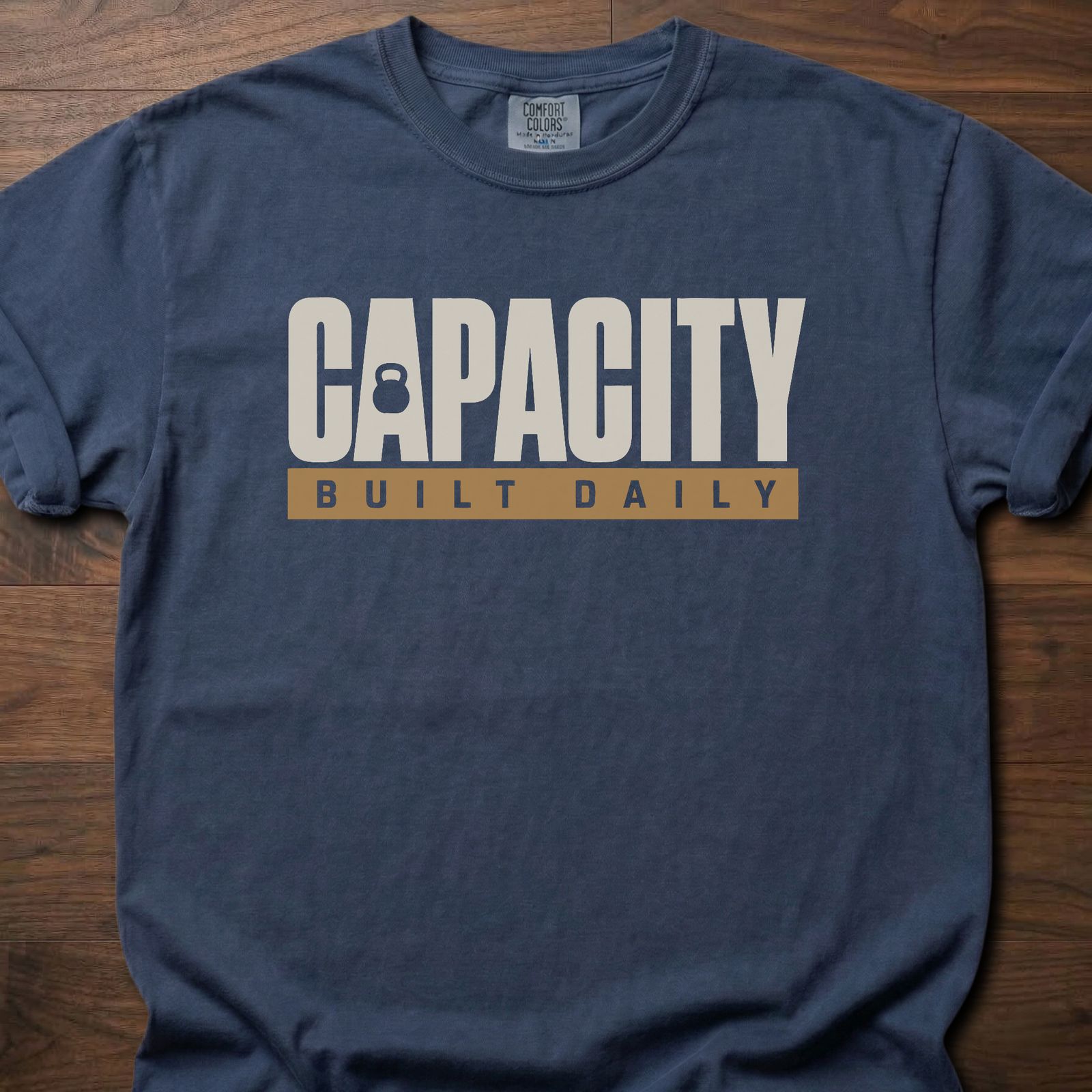 Capacity Built Daily longevity fitness apparel with bold text and kettlebell graphic – Navy