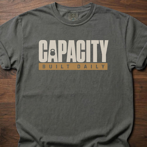 Capacity Built Daily longevity fitness apparel with bold text and kettlebell graphic – Pepper