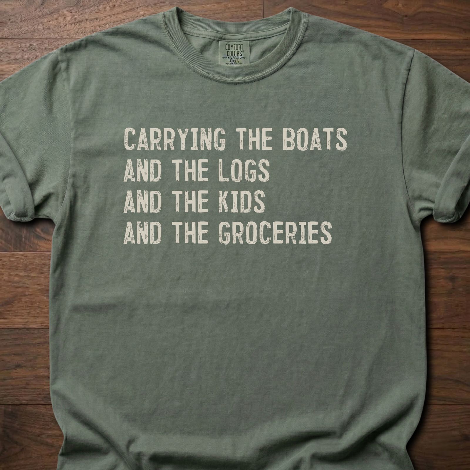 Carrying The Boats strength training t shirt with stacked list of daily carries – Moss