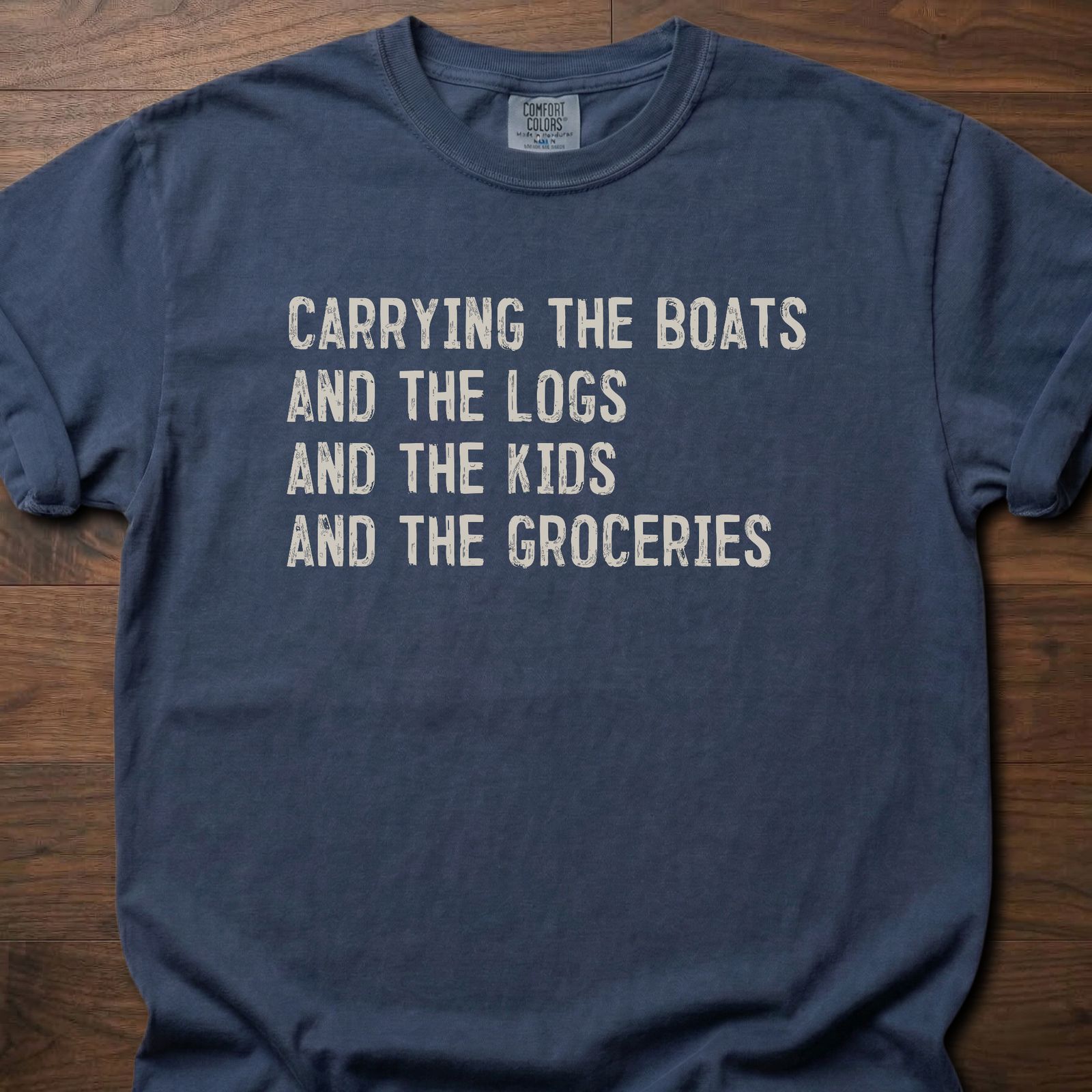 Carrying The Boats strength training t shirt with stacked list of daily carries – Navy