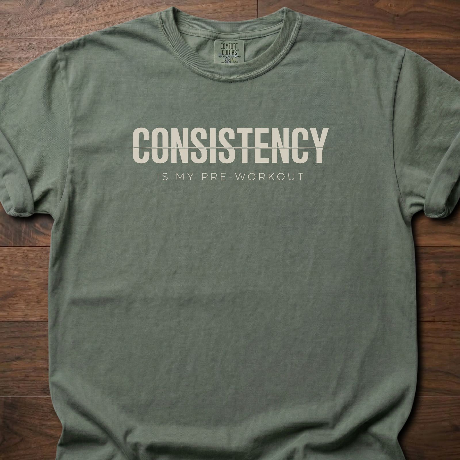 Consistency fitness lifestyle t-shirt with bold text and pre-workout message – Moss