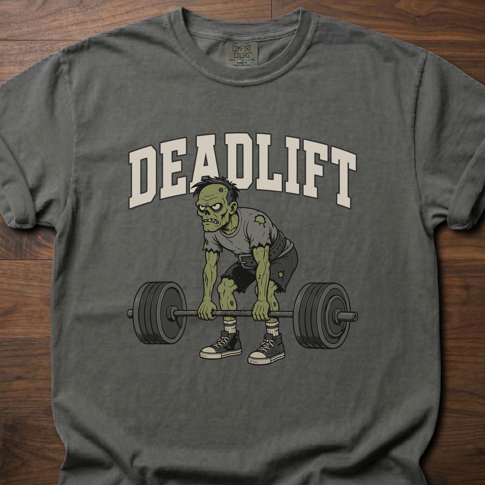 Deadlift strength training t-shirt featuring zombie lifter gripping barbell in athletic stance – Pepper
