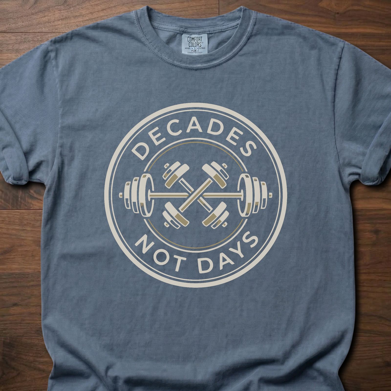 Decades Not Days strength training lifestyle clothing with circular barbell and dumbbell design – Blue Jean