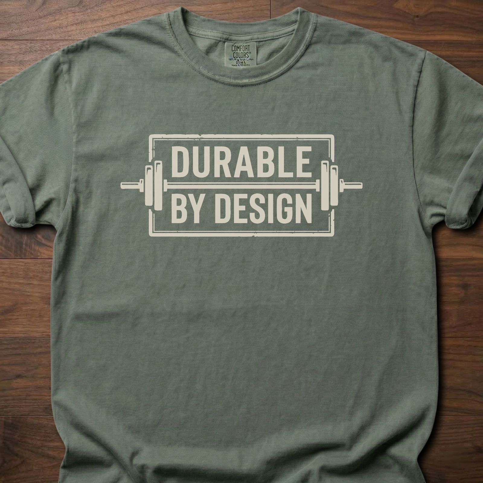 Durable By Design fitness lifestyle t shirt with bold rectangular logo and industrial frame graphic – Moss