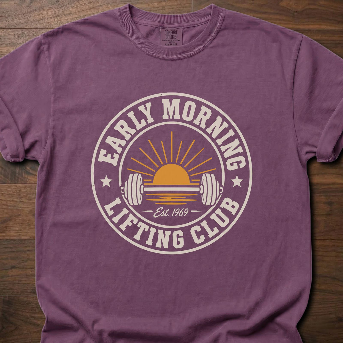 Early Morning Lifting Club strength training t-shirt with sunrise and dumbbell badge design – Berry