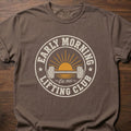 Early Morning Lifting Club strength training t-shirt with sunrise and dumbbell badge design – Espresso
