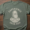 Experience Over Ego gym lifestyle shirt with medieval helmet and weight plate design – Moss