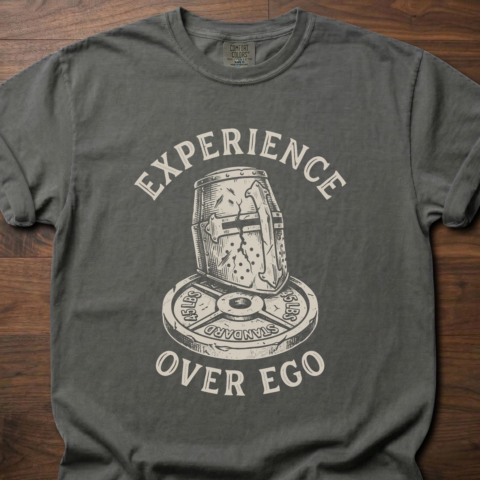 Experience Over Ego gym lifestyle shirt with medieval helmet and weight plate design – Pepper