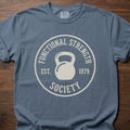Functional Strength Society gym lifestyle shirt featuring kettlebell logo and established 1979 badge – Blue Jean