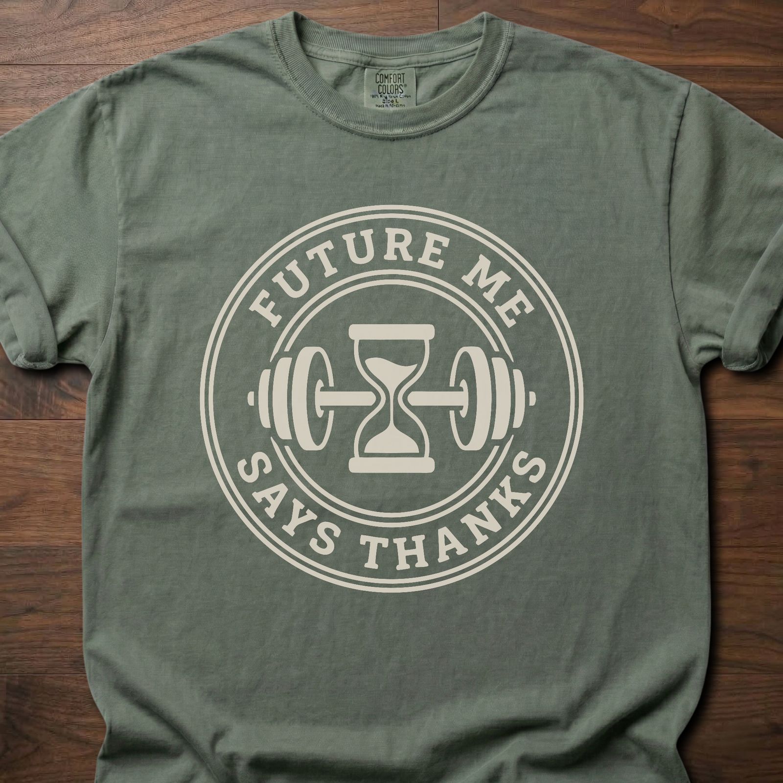 Future Me strength training t-shirt with hourglass and barbell design in circular badge – Moss