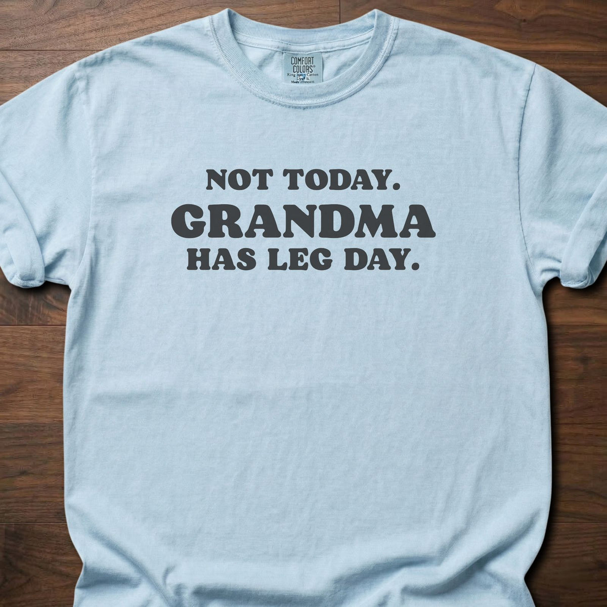 Grandma Has Leg Day funny gym shirt with bold retro block-letter graphic – Chambray