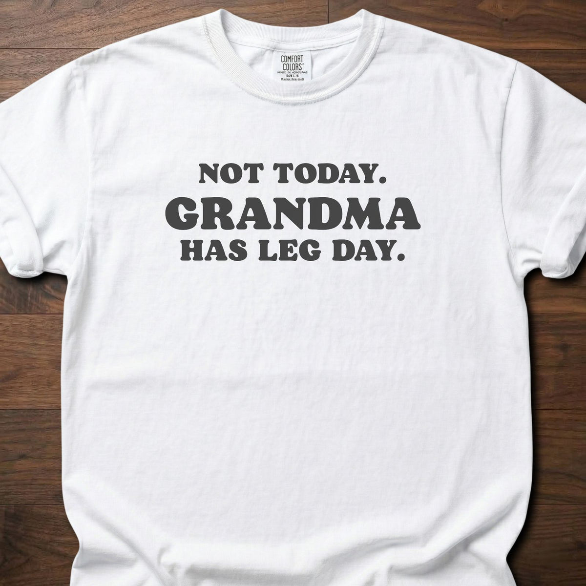Grandma Has Leg Day funny gym shirt with bold retro block-letter graphic – White