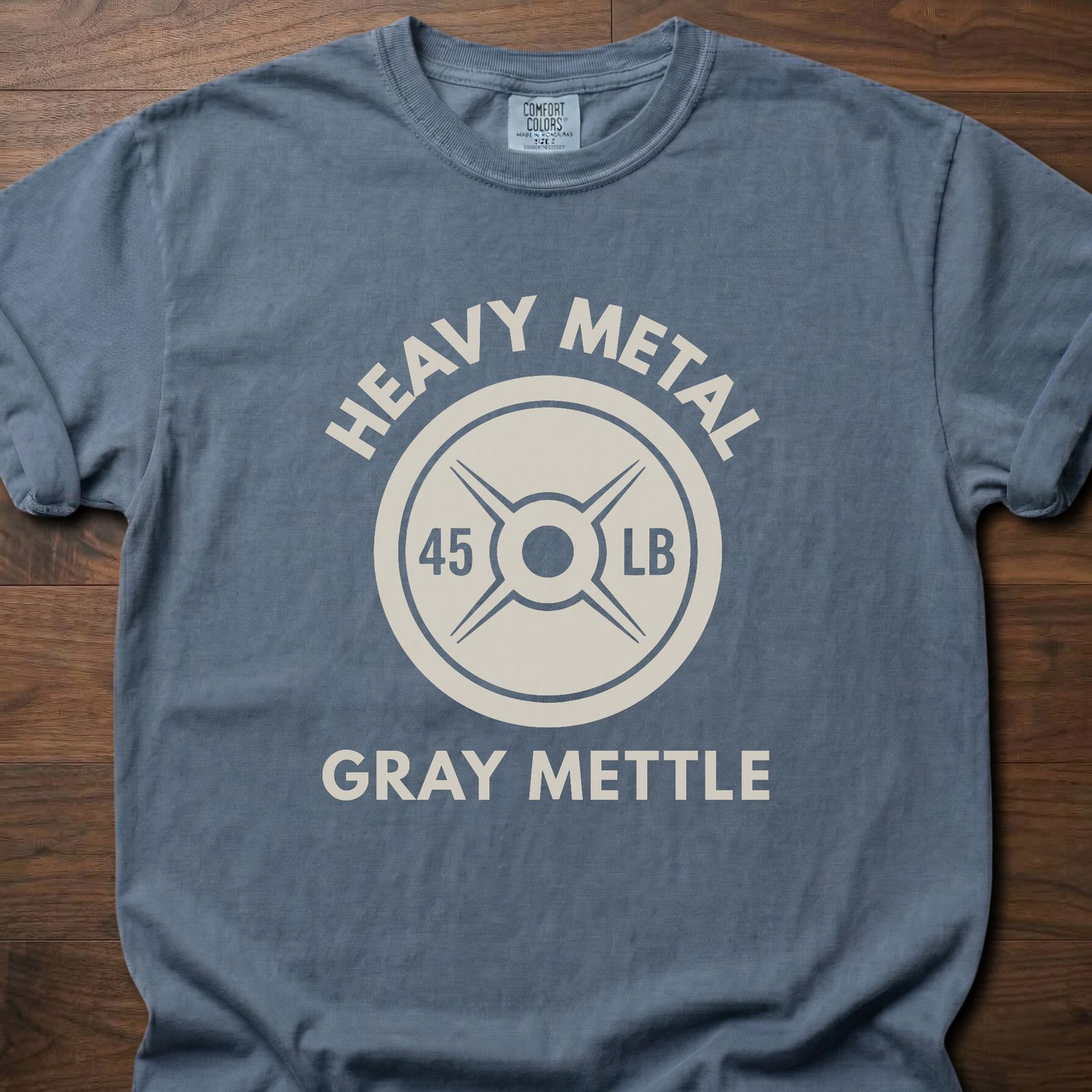 Gray Mettle strength training t-shirt featuring 45 lb weight plate design with Heavy Metal text – Blue Jean