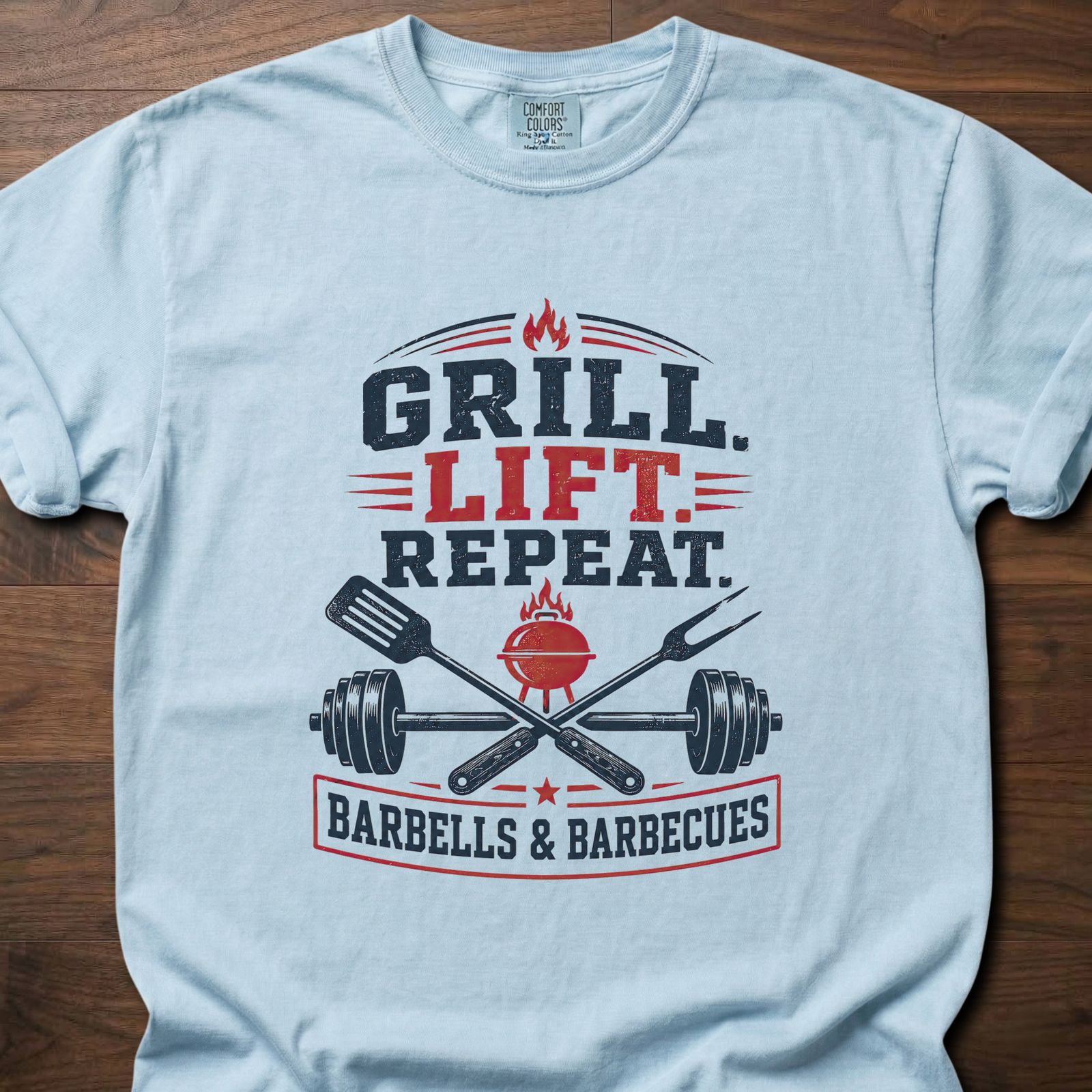 Grill Lift Repeat strength training t-shirt featuring barbell and BBQ grill crossed design – Chambray