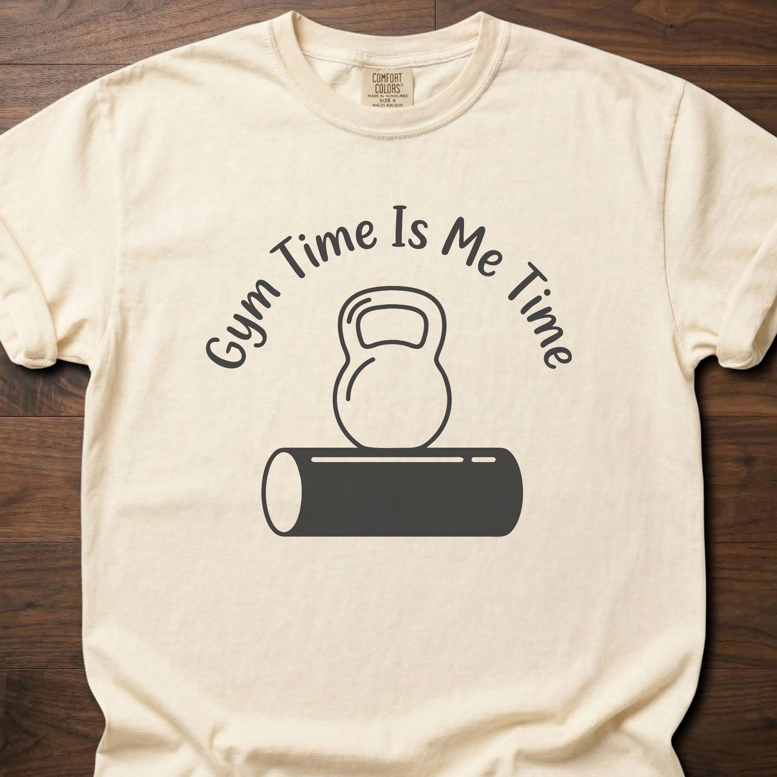 Gym Time fitness lifestyle t shirt featuring kettlebell on foam roller with curved text design – Ivory