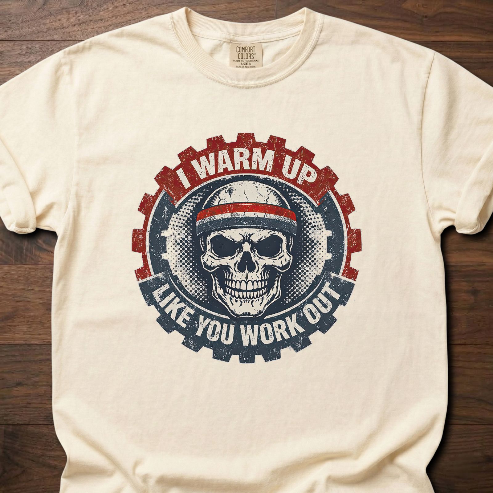 I Warm Up strength training lifestyle clothing featuring skull with headband and gear design – Ivory