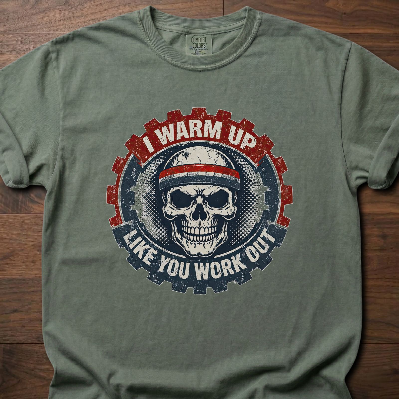 I Warm Up strength training lifestyle clothing featuring skull with headband and gear design – Moss