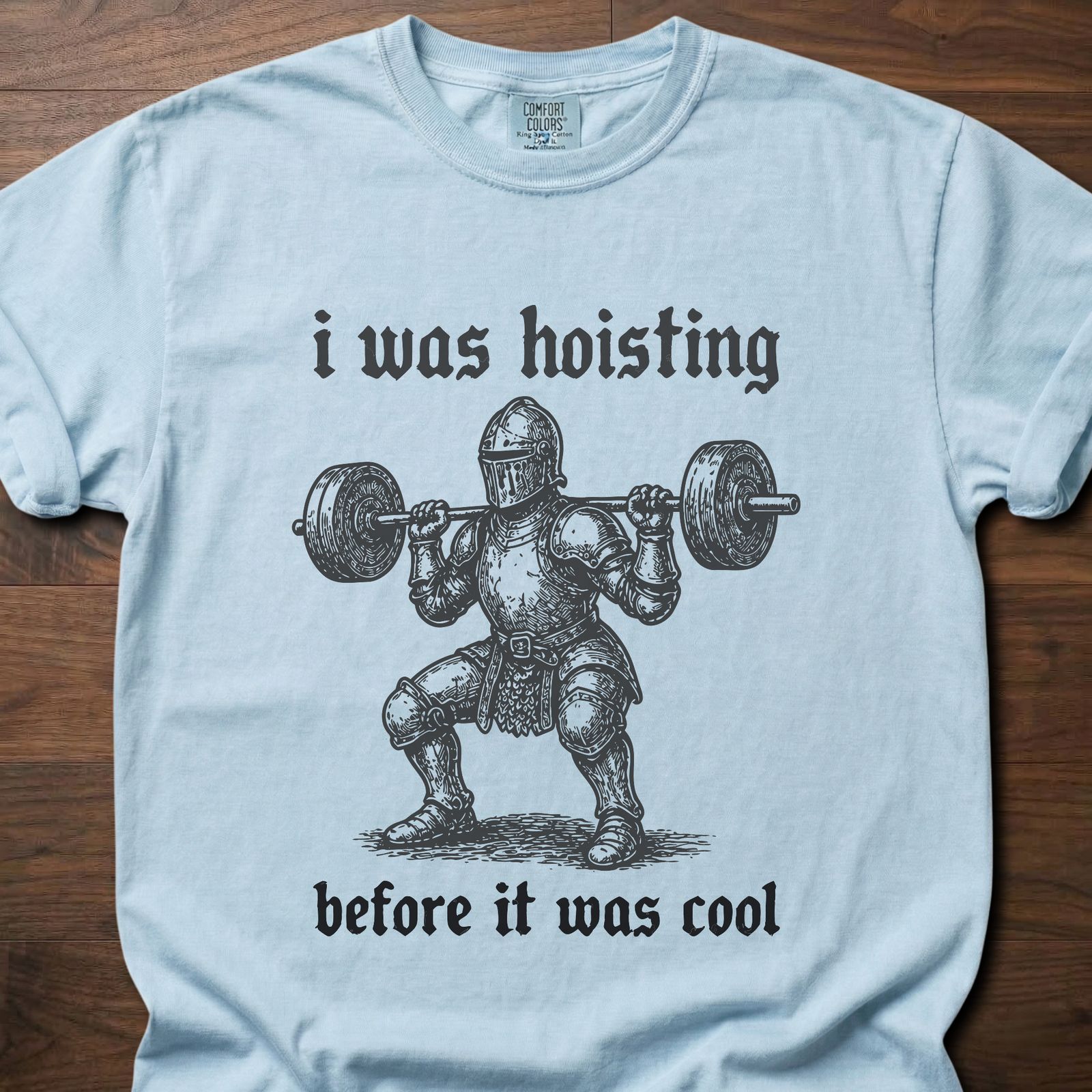 I Was Hoisting strength training lifestyle clothing featuring knight with barbell design – Chambray