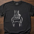 Kettlebell T-Shirt with hand gripping kettlebell design for strength training lifestyle clothing – Black