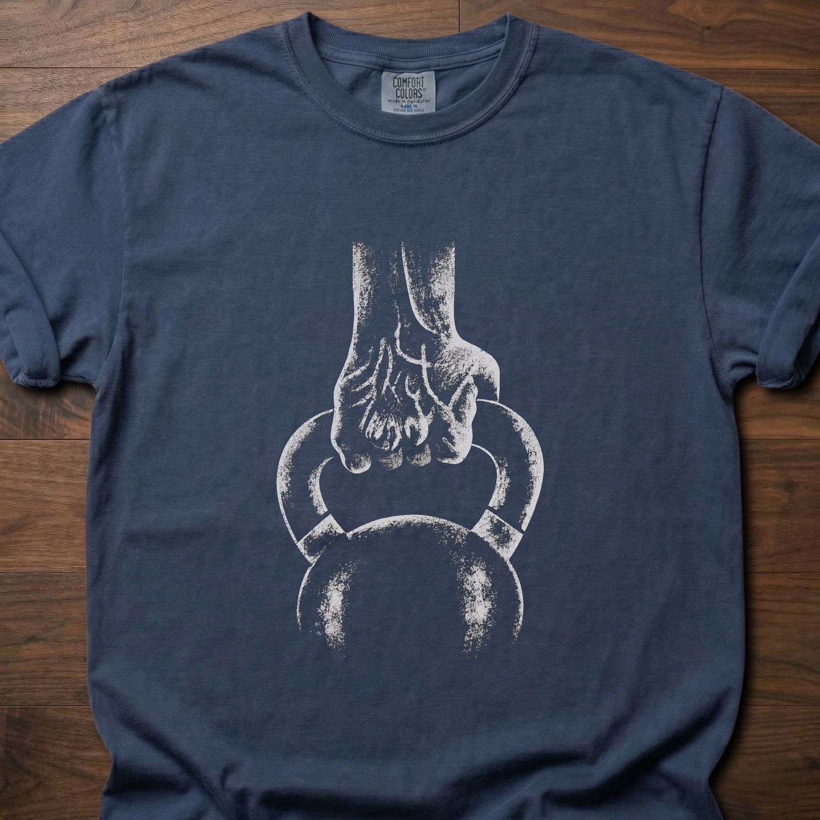 Kettlebell T-Shirt with hand gripping kettlebell design for strength training lifestyle clothing – Navy